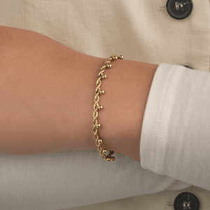 Armband gedraaid bollen goud
