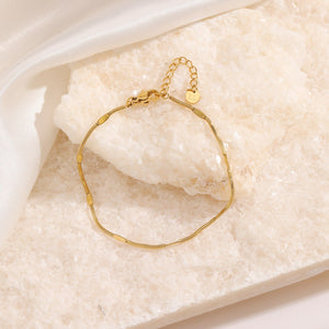 Dunne motief armband goud