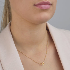 Ketting verbonden hartjes goud