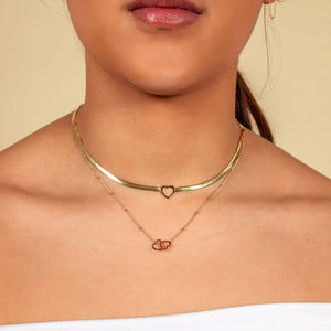 Ketting verbonden hartjes goud