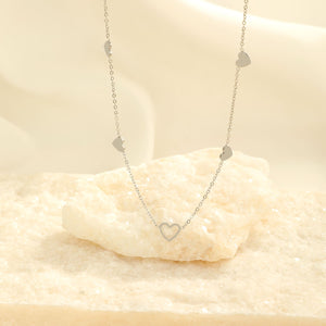 Ketting vier gesloten hartjes zilver