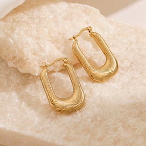 Oorbellen rechthoekig gestreept goud