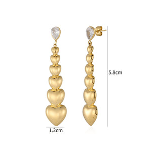 Oorstekers stacked hearts goud