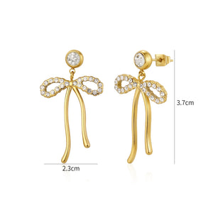 Oorstekers strik met steentjes goud