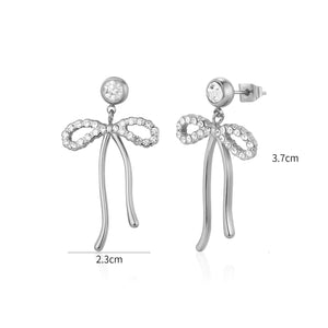 Oorstekers strik met steentjes zilver