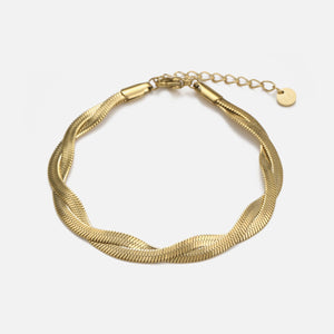 Platte gedraaide armband goud