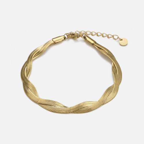 Platte gedraaide armband goud