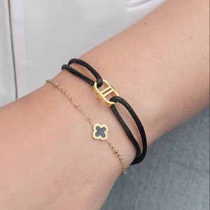 Single klaver armband goud/zwart