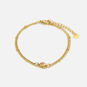 Tweelaags armband met roze steentje goud