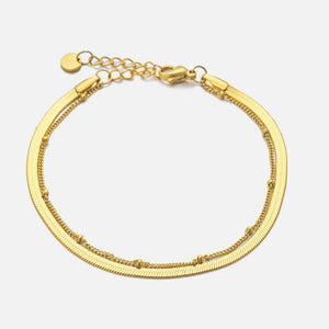 Tweelaags plat & bolletjes goud