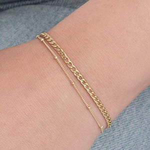 Tweelaags schakel & bolletjes goud