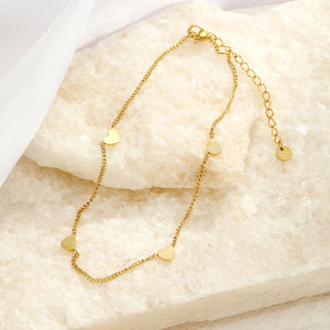 Enkelband hartjes goud