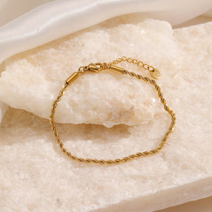 Gedraaide armband 2mm goud
